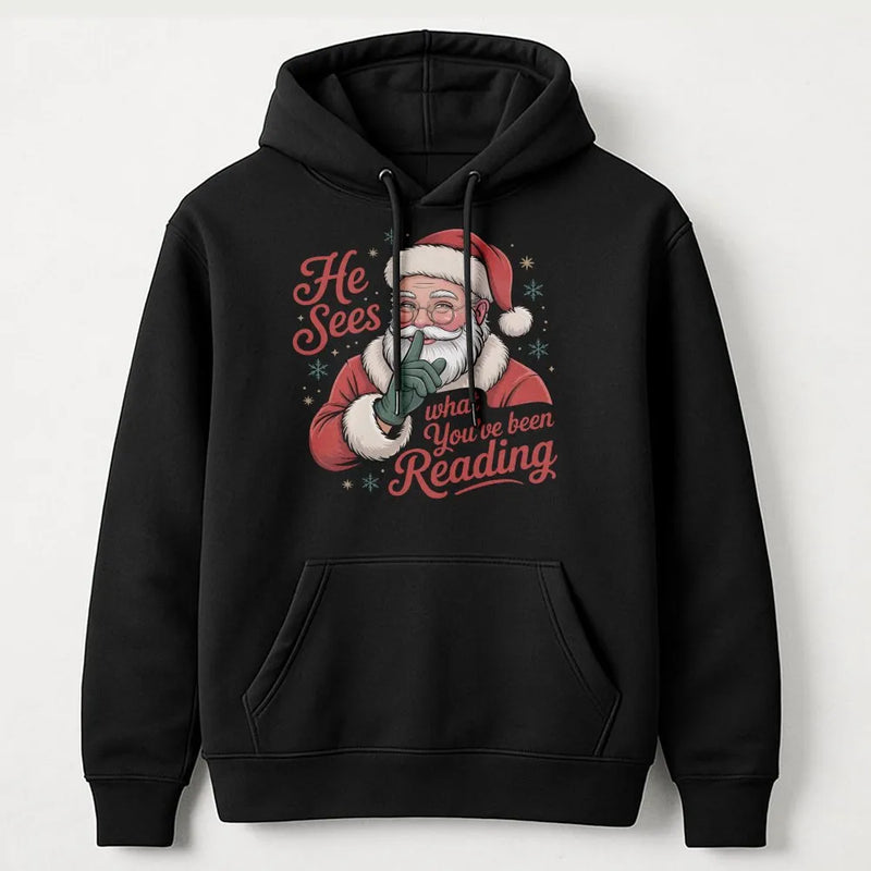 Humorous Bookworm Santa Hooded Sweatshirt, He Sees What You've Been Reading Hoodie, Christmas Book Lover Hoodie, Holiday Reader Graphic Sweater