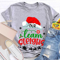 Humorous Holiday Coworker T-Shirt, Our Team Sleighs Christmas Shirt, Santa Hats Snowflakes Xmas Tee, Festive Work Team Shirt, Xmas Present Tee