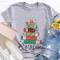 Colorful Crayons Bows Holiday Shirt, Personalized Christmas T-Shirt, Custom Name Kids Xmas Graphic Tee, Festive School Party Shirt