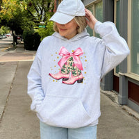Western Holly and Bow Hooded Sweatshirt, Pink Cowboy Boots Christmas Hoodie, Coquette Cowgirl Pullover, Festive Holiday Present for Her