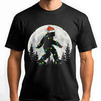 Santa Hat Sasquatch Fairy Lights Graphic Tee, Bigfoot Christmas T-Shirt, Humorous Cryptid Xmas Holiday T-Shirt, Festive Yeti Lover Top