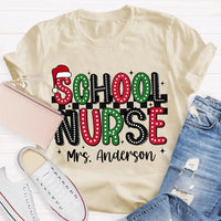 Custom Name Santa Hat Graphic Tee, Personalized School Nurse Christmas Shirt, RN Nurse Holiday T-Shirt, Healthcare Staff Xmas Present