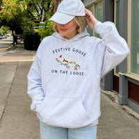Silly Goose Holiday Sweatshirt, Festive Goose Christmas Hoodie, Adorable Animal Santa Hat Pullover, Humorous Duck Xmas Season Hooded Sweater