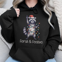 Humorous Christmas Animal Graphic Sweatshirt, Feral and Festive Raccoon Hoodie, Adorable Trash Panda Holiday Pullover, Retro Xmas Hoodie