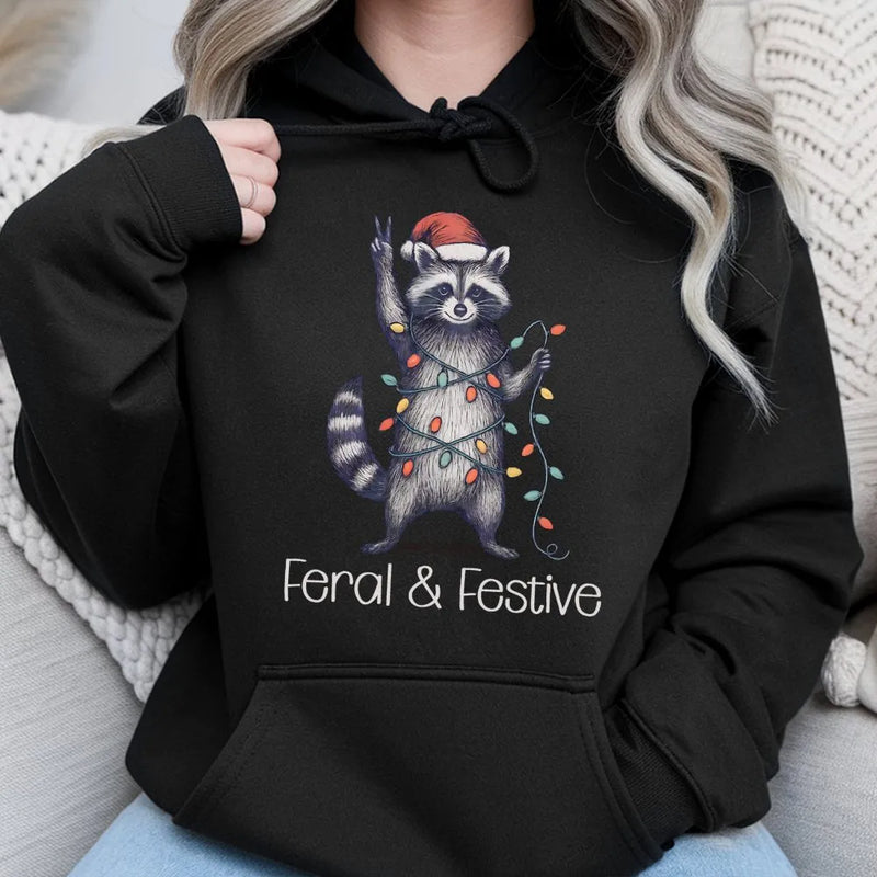 Humorous Christmas Animal Graphic Sweatshirt, Feral and Festive Raccoon Hoodie, Adorable Trash Panda Holiday Pullover, Retro Xmas Hoodie