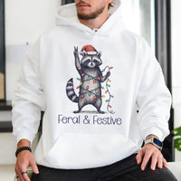 Humorous Christmas Animal Graphic Sweatshirt, Feral and Festive Raccoon Hoodie, Adorable Trash Panda Holiday Pullover, Retro Xmas Hoodie