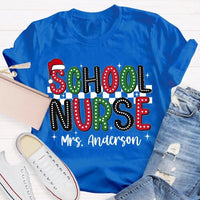 Custom Name Santa Hat Graphic Tee, Personalized School Nurse Christmas Shirt, RN Nurse Holiday T-Shirt, Healthcare Staff Xmas Present