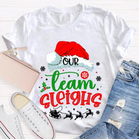 Humorous Holiday Coworker T-Shirt, Our Team Sleighs Christmas Shirt, Santa Hats Snowflakes Xmas Tee, Festive Work Team Shirt, Xmas Present Tee