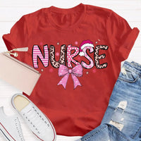Nurse Christmas Shirt, School Nurse Santa Hat Pink Bow Shirt, Festive Holiday Medical Tee, Adorable Coquette Nurse Graphic Shirt