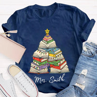 Personalized Holiday Shirt, Custom Christmas Trees and Books T-Shirt, Comfy Book Lover Xmas Graphic Tee, Custom Name Christmas Present Tee