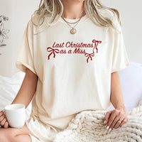 Festive Bow Typography Bride Tee, Last Christmas as A Miss T-Shirt, Holiday Engagement Graphic Shirt, Winter Bachelorette Present for Her