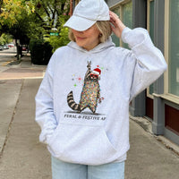 Tangled Christmas Lights Hoodie, Feral and Festive Raccoon Hoodie, Humorous Holiday Animal Pullover Hoodie, Retro Xmas Sweatshirt, Raccoon Present