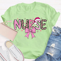 Nurse Christmas Shirt, School Nurse Santa Hat Pink Bow Shirt, Festive Holiday Medical Tee, Adorable Coquette Nurse Graphic Shirt