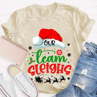 Humorous Holiday Coworker T-Shirt, Our Team Sleighs Christmas Shirt, Santa Hats Snowflakes Xmas Tee, Festive Work Team Shirt, Xmas Present Tee