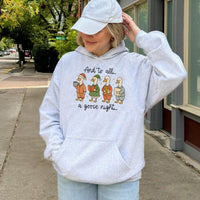 Adorable Pajama Geese Graphic Hooded Sweatshirt, Goose Christmas Hoodie, Silly Goose Holiday Pullover, Humorous Xmas Present for Goose Lovers
