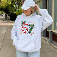 Festive Candy Cane 67th Birthday Sweatshirt, 67 Birthday Christmas Hoodie, Holiday Number 67 Hooded Pullover, Christmas Birthday Present Hoodie