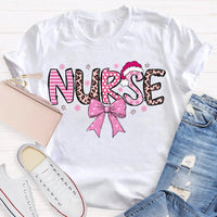 Nurse Christmas Shirt, School Nurse Santa Hat Pink Bow Shirt, Festive Holiday Medical Tee, Adorable Coquette Nurse Graphic Shirt