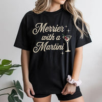 Retro Christmas Cocktail Graphic Tee, Merrier with a Martini Shirt, Humorous Holiday Drinking T-Shirt, Vintage Xmas Party Graphic T-Shirt
